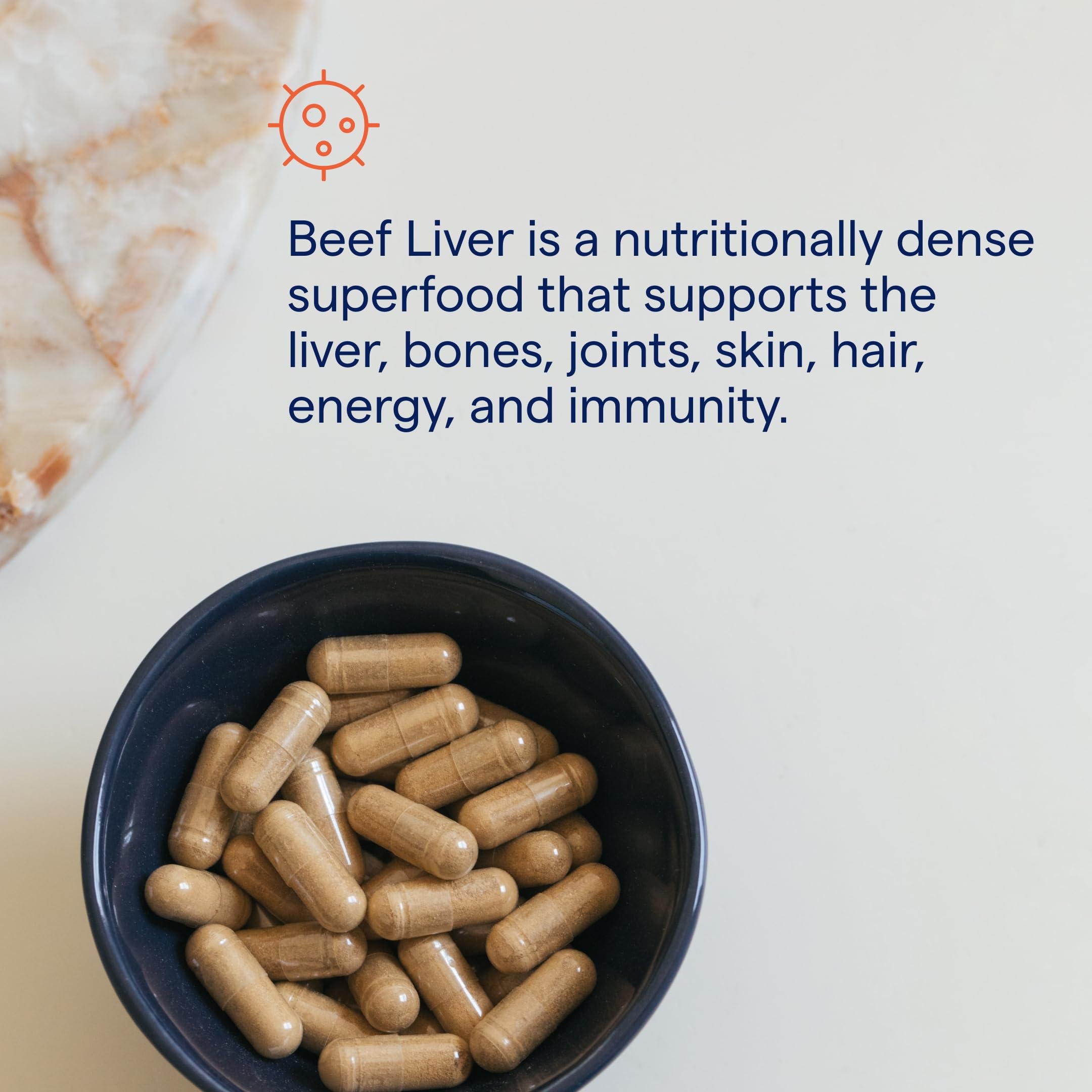 Trace Minerals Beef Liver Extract 3000 mg capsules displayed with a glass of water
