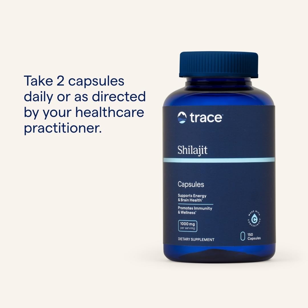 Trace Minerals Shilajit Capsules in packaging on a wooden surface