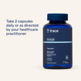 Trace Minerals Shilajit Capsules in packaging on a wooden surface