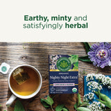 Traditional Medicinals Nighty Night Herbal Tea brewed cup with herbs