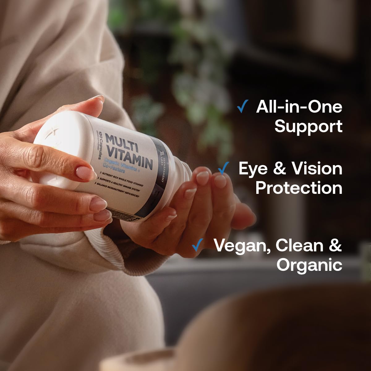Transparent Labs Multivitamin bottle open with capsules