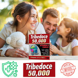 Tribedoce B-Complex Liquid Vitamins on a wooden table with a green plant