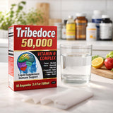 Tribedoce B-Complex Liquid Vitamins with a measuring spoon for dosage