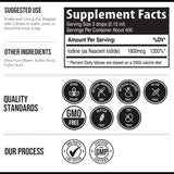 Triquetra Health Iodine Liquid Supplement on a wooden surface