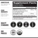 Triquetra Health Organic Plant-Based Magnesium capsules on a wooden surface