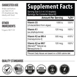 Triquetra Health Total K2 Vitamin K2 MK7 & MK4 supplement on a wooden table