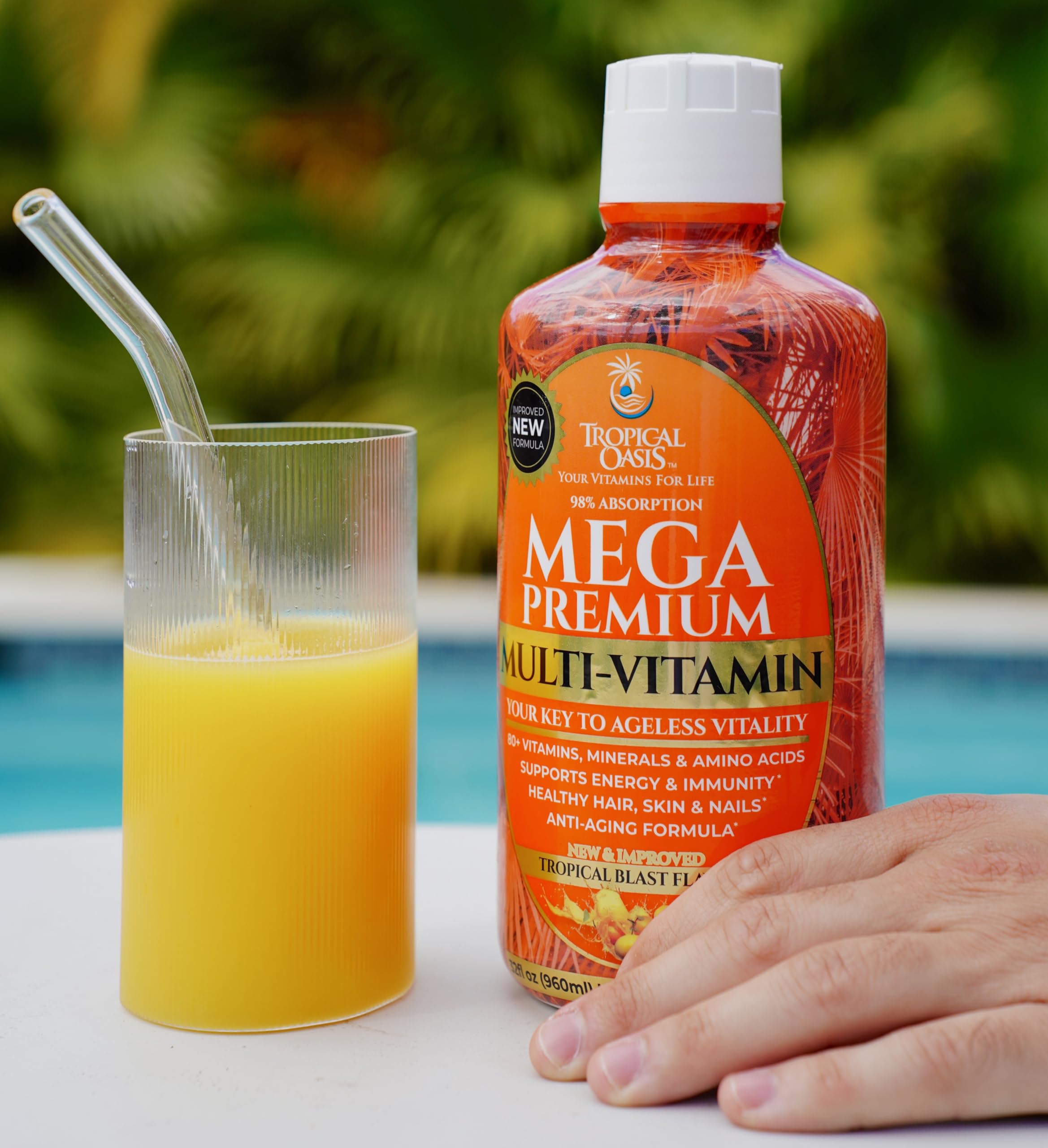 Tropical Oasis Mega Premium Multivitamin bottle with measuring cup