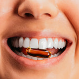 True Grace Omega-3 Fish Oil 1500mg softgels on a wooden table