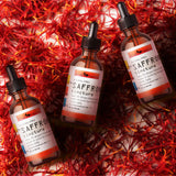 True Nests Saffron Tincture liquid drops in a spoon