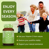 True Veda Organic Vitamin C capsules on a wooden table