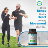 TRUEMED Vitamin D3 & K2 Capsules with a glass of water
