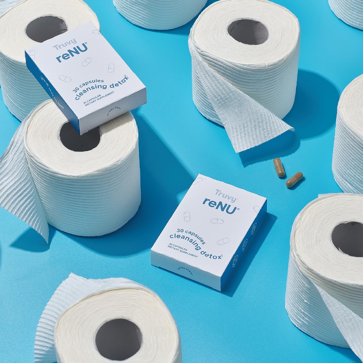 Truvy daily Support Capsules on a wooden table