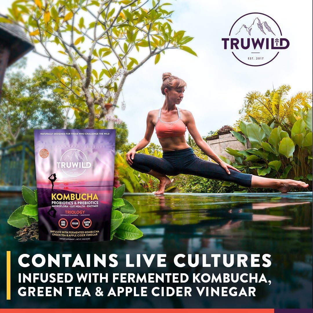 TruWild Kombucha Powder 227g displayed with lifestyle items