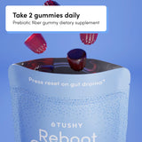 TUSHY Reboot Prebiotic Fiber Gummies on a kitchen counter