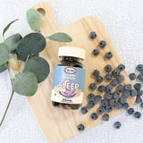TWINE Sleep Gummies in a bowl with blueberries