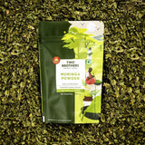 Two Brothers India Farms Moringa Powder sprinkled on a salad