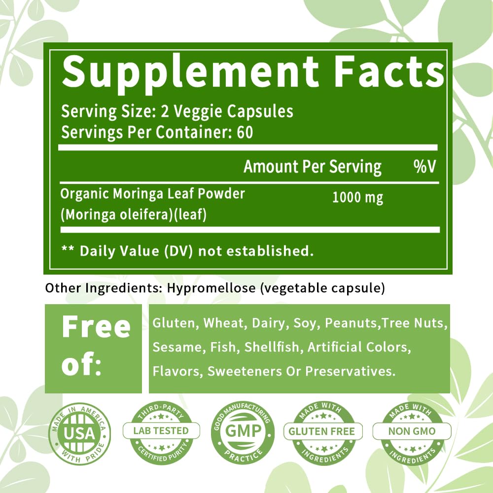 TWOHHACC Moringa Powder Capsules 1000mg on wooden table
