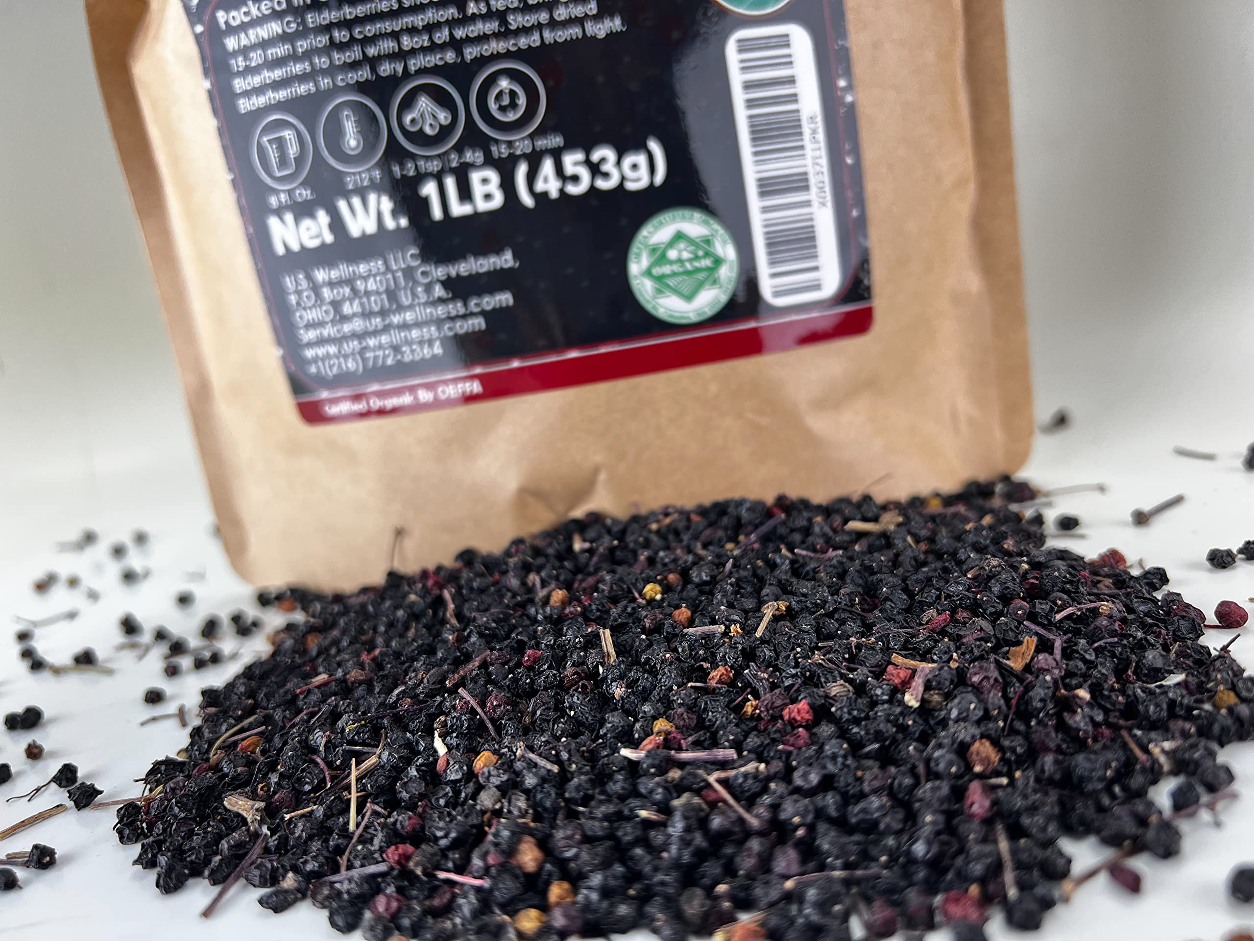 U.S. Wellness Naturals Organic Dried Elderberries with cooking utensils
