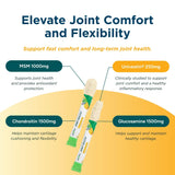 Univera Joint Support Drink Mix powder in a glass of water