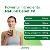 Univera MetaGreens in a glass of water