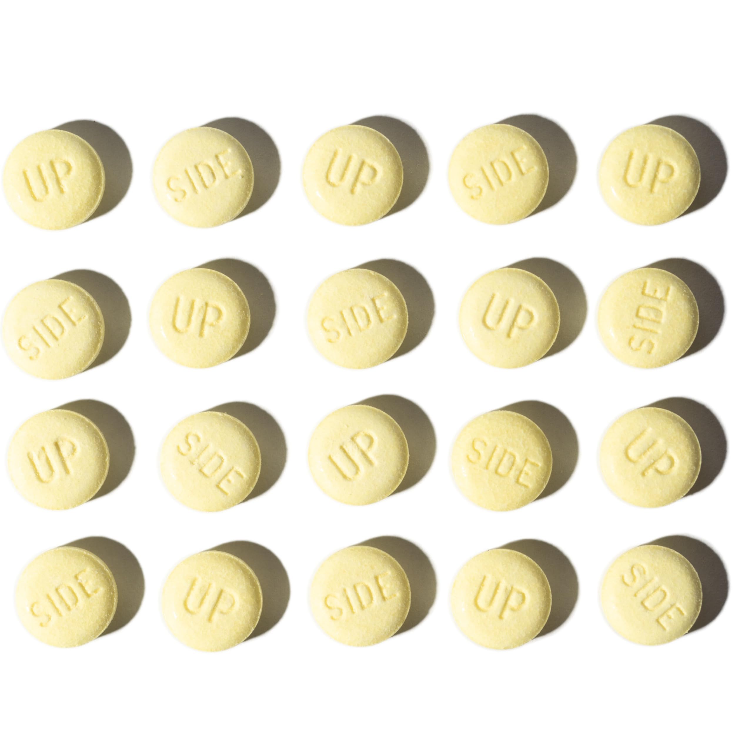 Up Side Kava Chill Pills Moon Mint on a wooden table