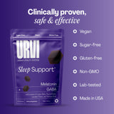 URVI Natural Sleep Aid Gummies Cherry flavour with a glass of water