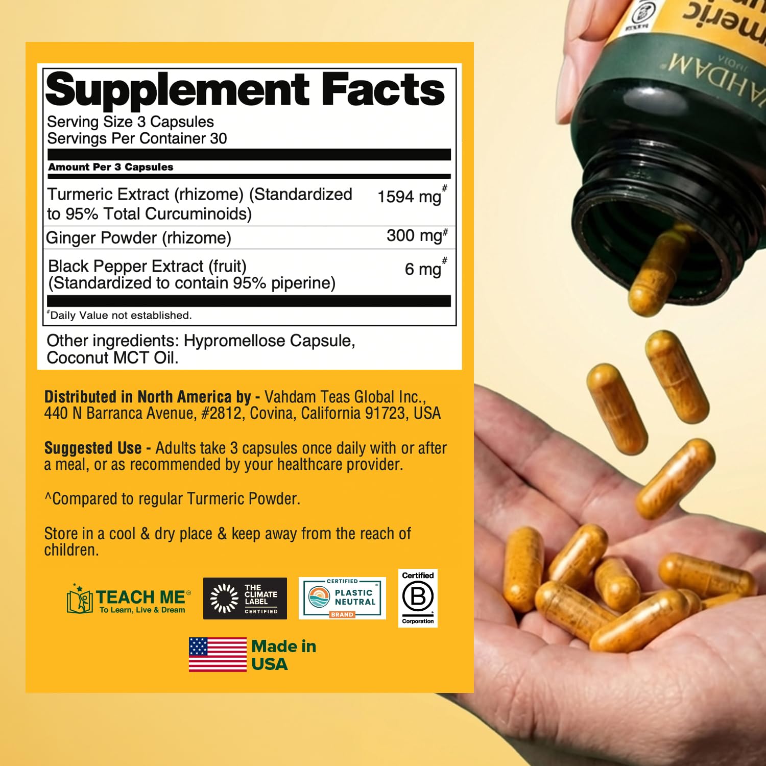 VAHDAM Turmeric Supplement capsules in hand