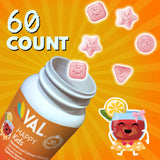 VAL Magnesium Supplement for Kids chewable tablets with a glass of water