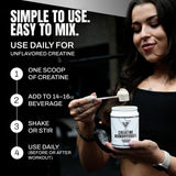 VEDGE Creatine Monohydrate Powder mixed in a glass of water