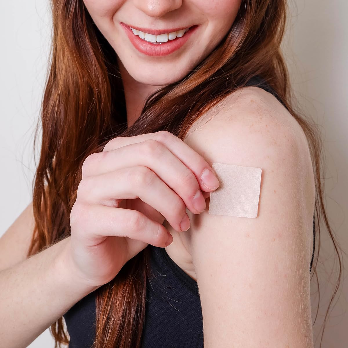Veru Wellness Calcium Patch on a person's arm