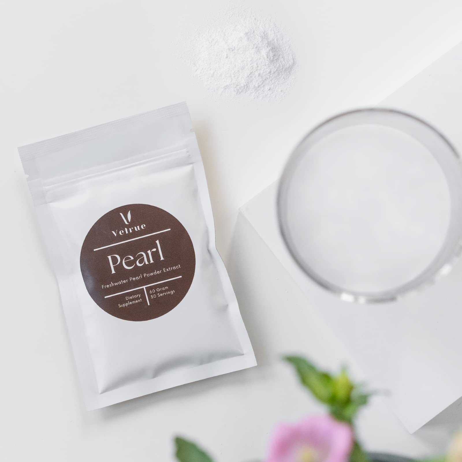vetrue Freshwater Pearl Powder 60g on a kitchen counter with coffee