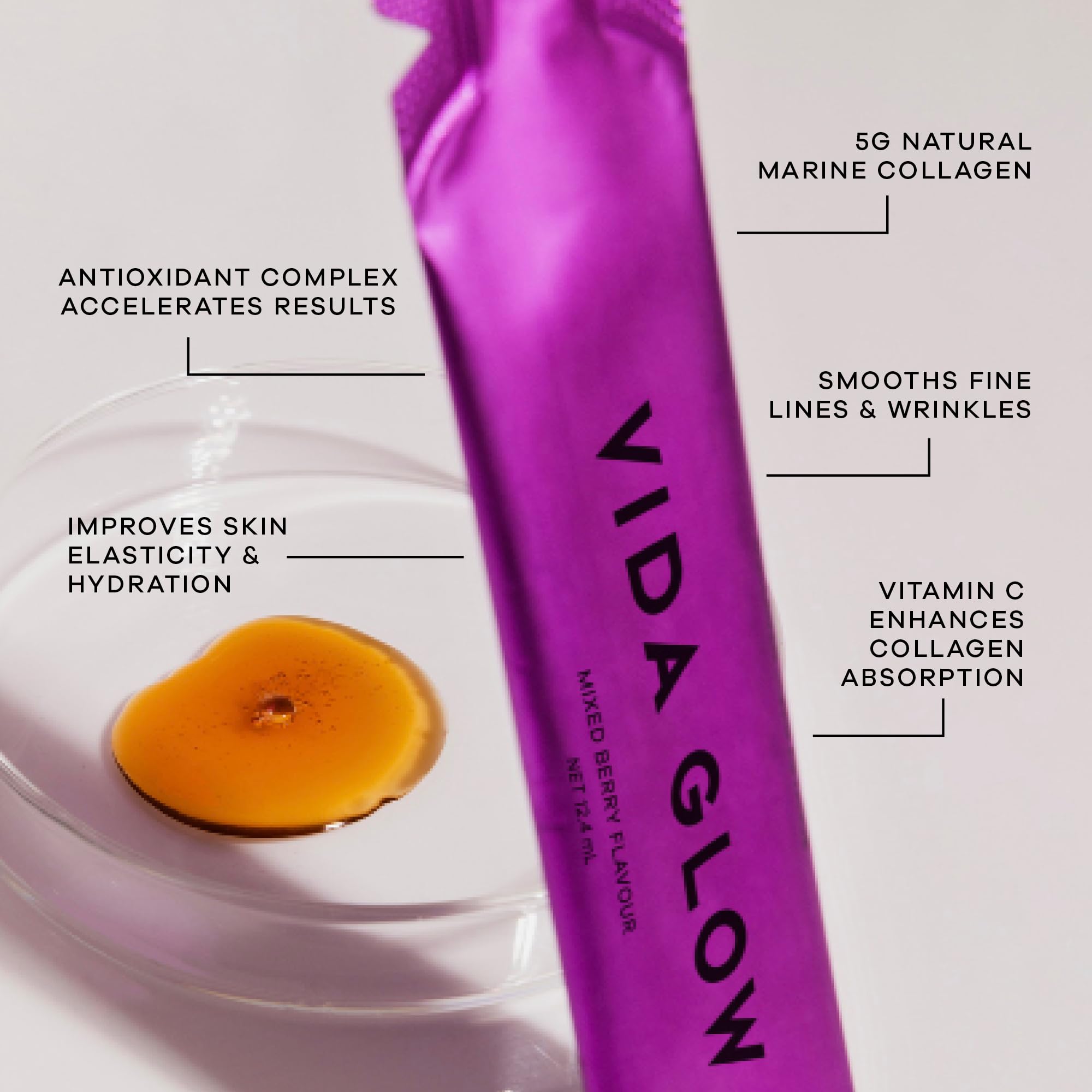 Vida Glow Collagen Peptides Liquid Supplement 454g berry flavour close-up