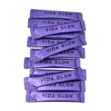 Vida Glow Marine Collagen Powder mixed in a glass of water