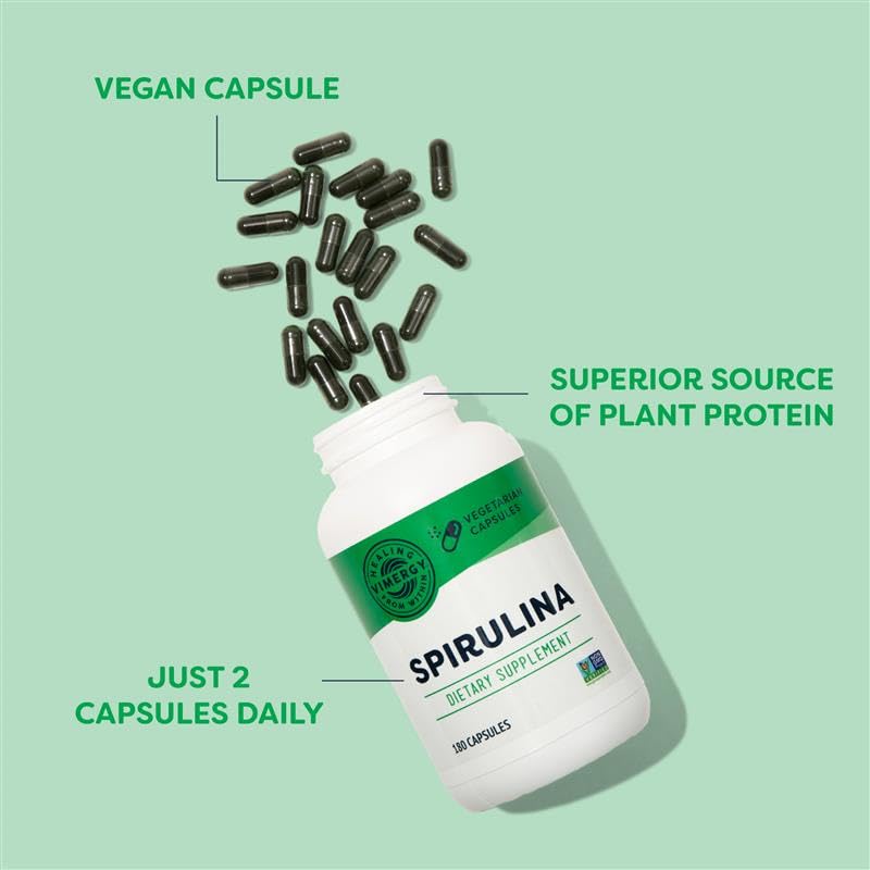 Vimergy Spirulina Capsules on a wooden table