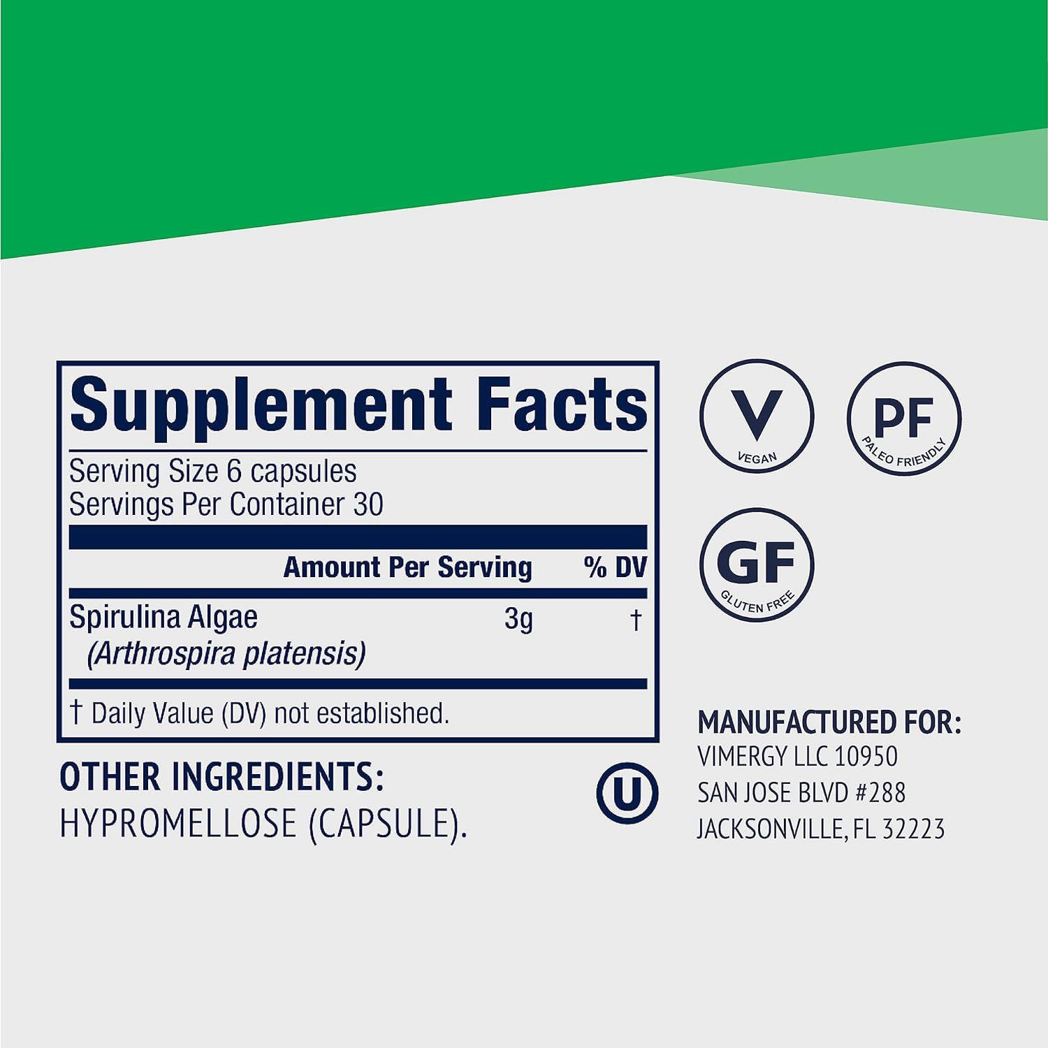 Vimergy Spirulina Capsules with a glass of juice