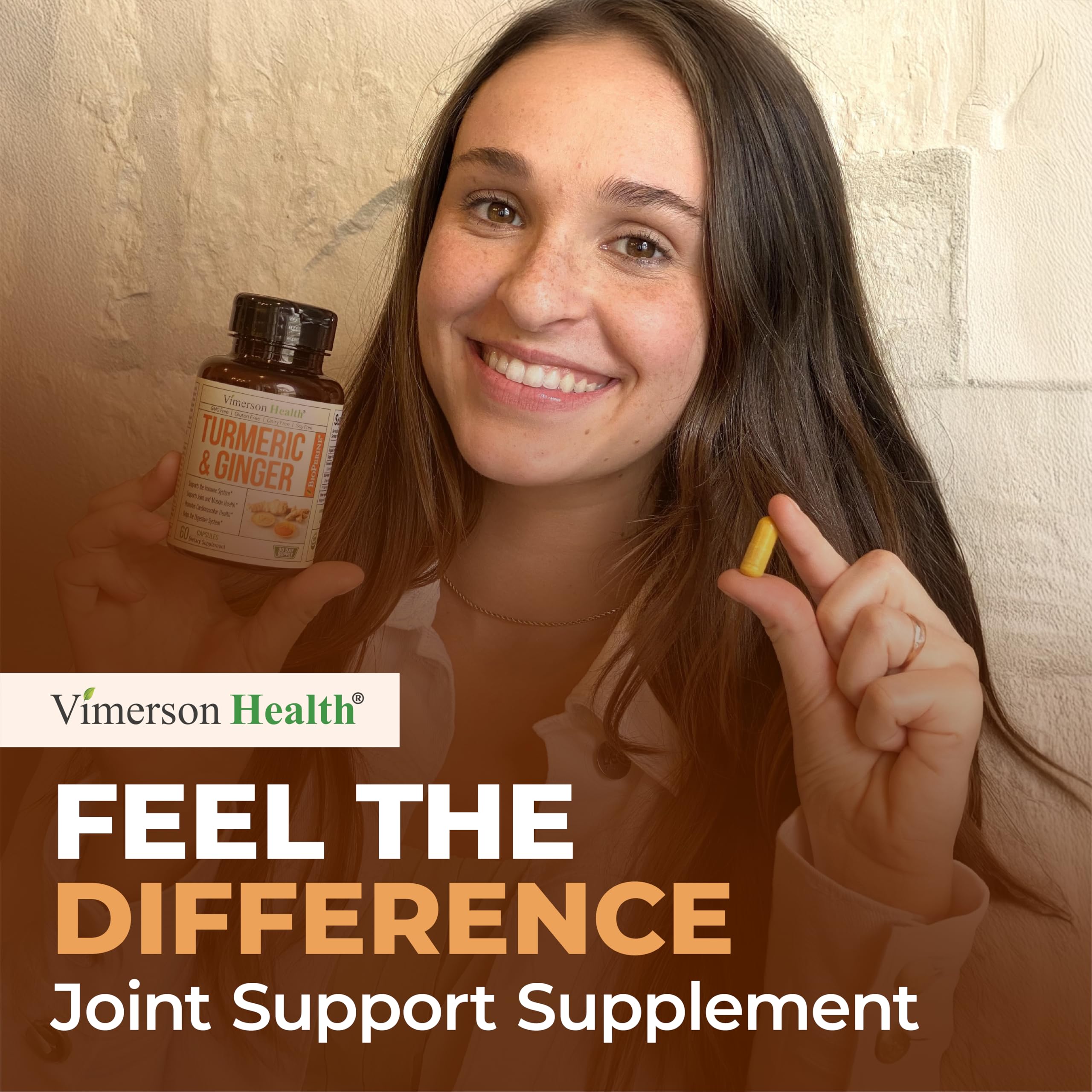 Vimerson Health Turmeric and Ginger Supplement capsule on a wooden table