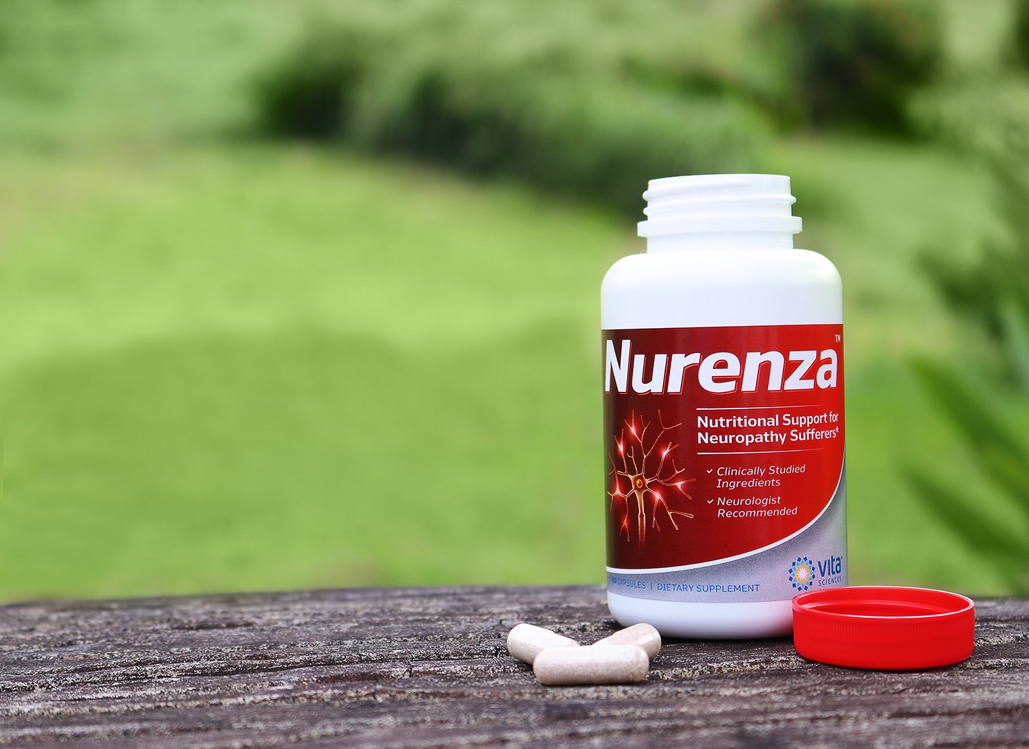 Vita Sciences Nurenza Neuropathy Nerve Support Formula on a wooden table