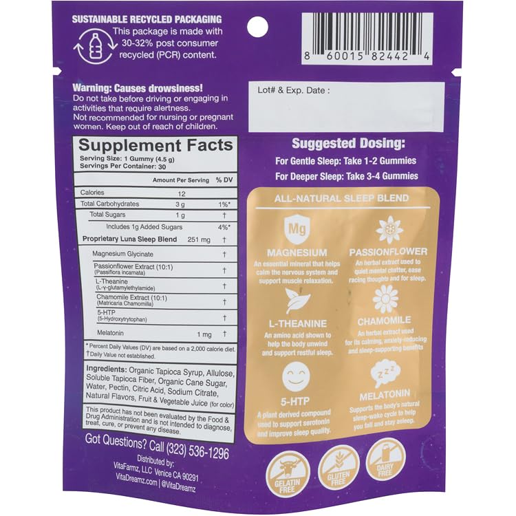 VitaDreamz Luna Berry Sleep Gummies with a glass of water