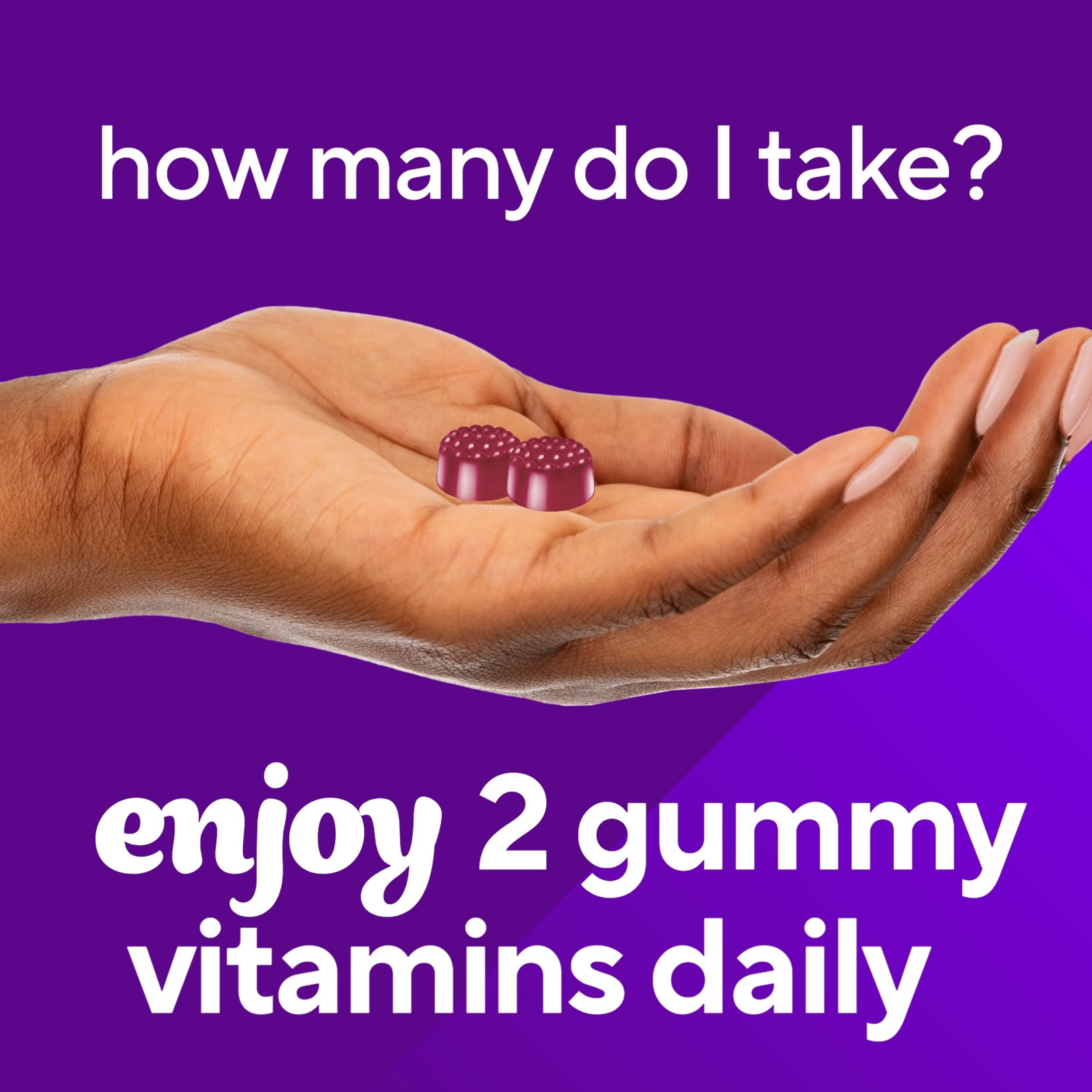 Vitafusion Extra Strength Biotin Gummies on a wooden table
