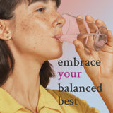 Vital Core Thyroid Extract bottle with a measuring spoon
