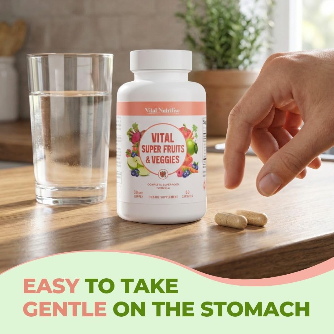 VITAL NUTRITIVE Super Fruits and Vegetables capsules in a hand