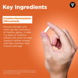 Vital Vitamins Creatine Monohydrate Capsules on a wooden table