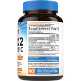 Vitalibre D3 + K2 Probiotic bottle with a glass of water