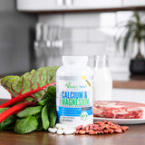 Vitalité Now! Calcium Magnesium Supplement on a wooden table