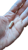 Vitalité Now! D-Mannose & Cranberry Extract capsules in a natural setting