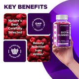 Vitamatic Biotin Gummies in a hand for size reference