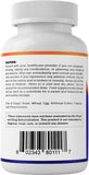 Vitamatic Blended Vitamin & Mineral Supplement displayed on a wooden table