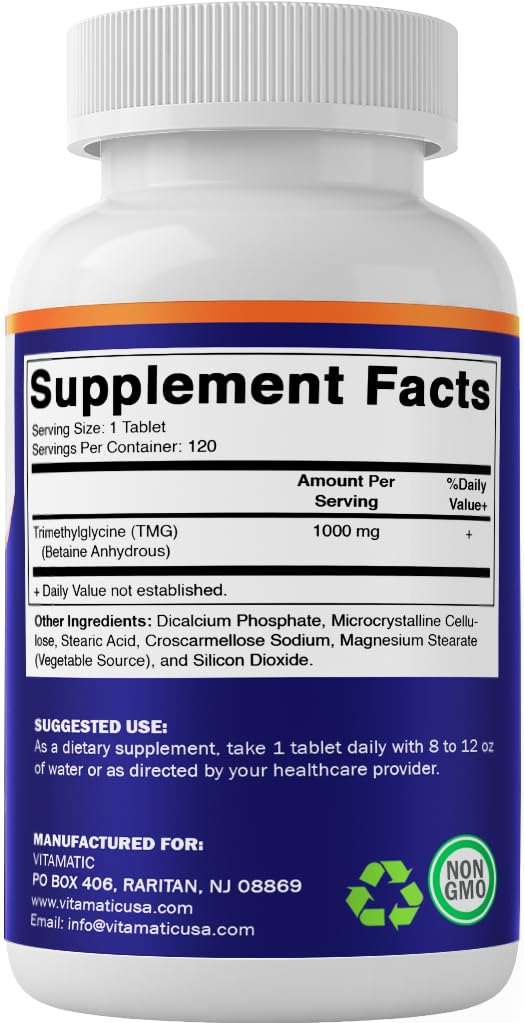 Vitamatic Blended Vitamin & Mineral Supplement with a glass of water