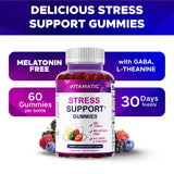 Vitamatic daily wellness Gummies on a wooden table with fresh berries