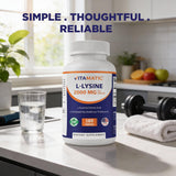 Vitamatic L-Lysine Tablets 2000mg on a wooden table